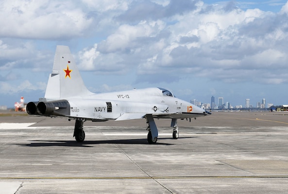 Fleet Readiness Center Southeast (FRCSE) first sold F-5 begins taxiing on a flight line at Naval Air Station Jacksonville to complete a functional check flight (FCF).