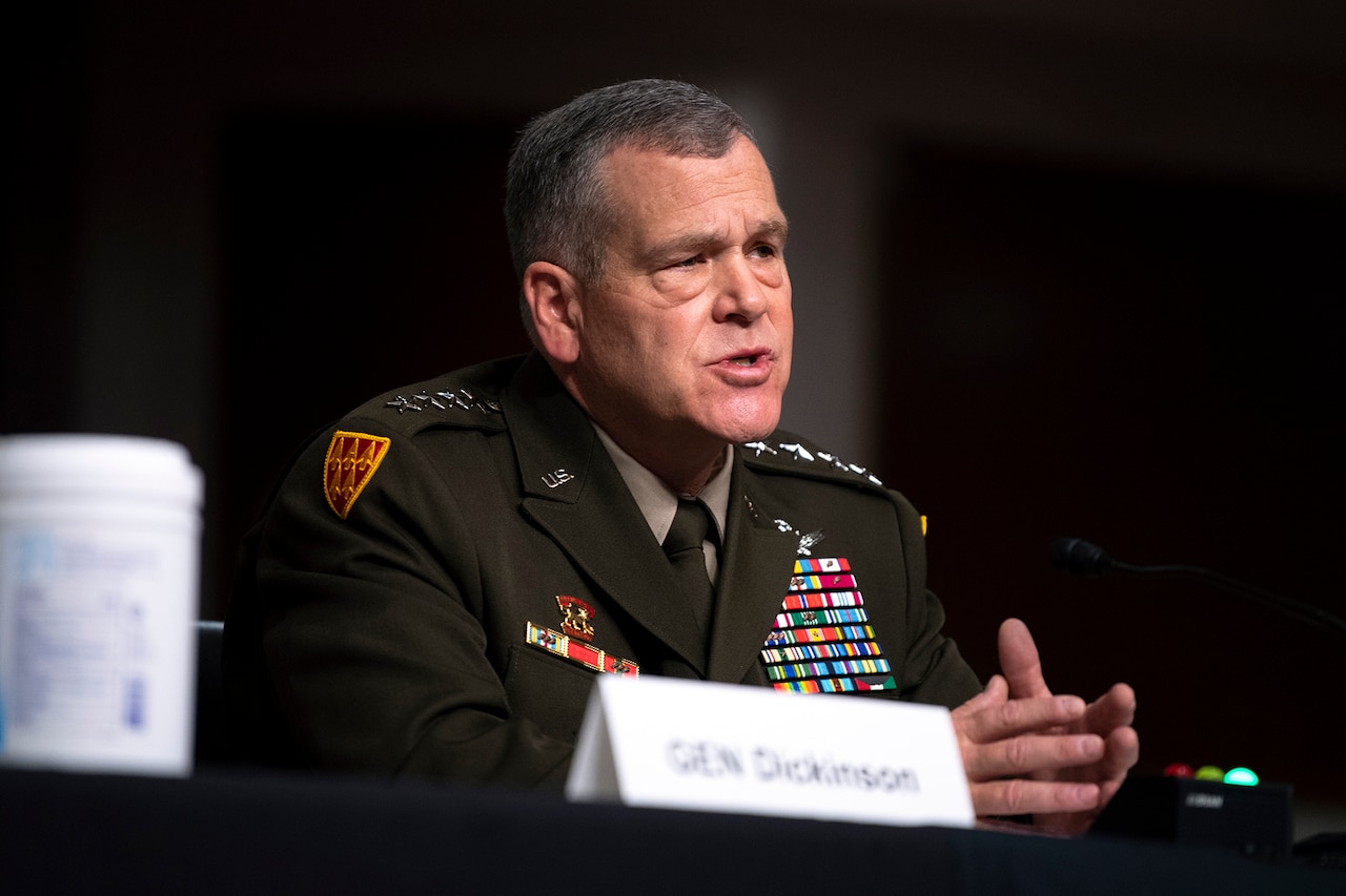 A man speaks at a hearing.