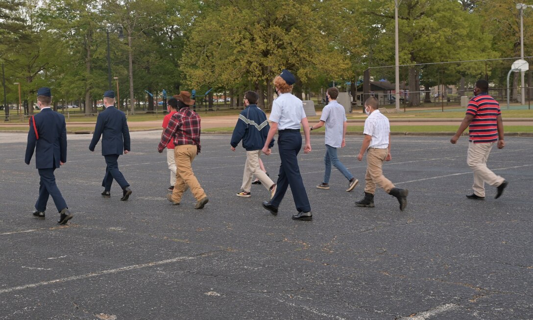 Cadets with the Golden Triangle Composite Squadron Civil Air Patrol, practice drill after a change of command ceremony, Apr. 15, 2021, on Columbus Air Force Base, Miss. The origins of Civil Air Patrol date to 1936, when Gill Robb Wilson, World War I aviator and New Jersey director of aeronautics, returned from Germany convinced of impending war. (U.S. Air Force photo by Airman 1st Class Jessica Haynie)