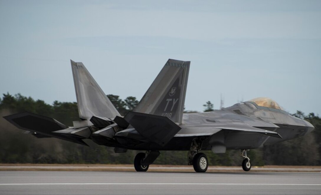A 43rd Fighter Squadron Raptor roars down the runway Nov. 30 at Eglin Air Force Base, Fla.