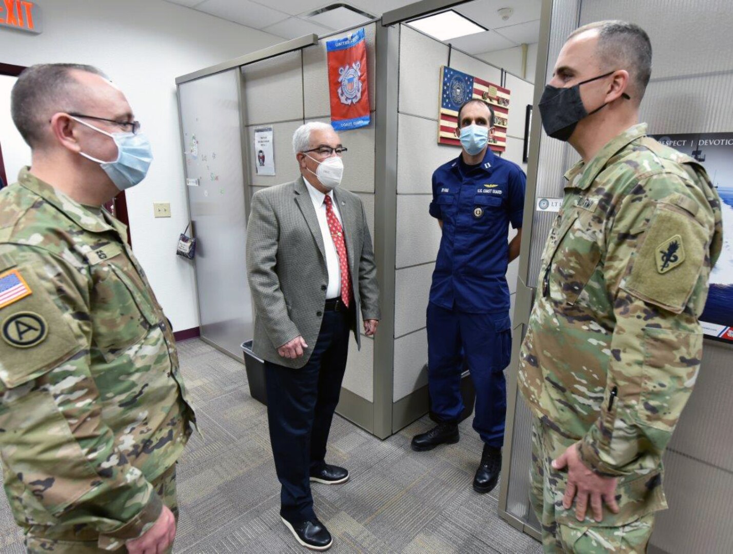 Col. James Jones (far left), Interservice Physician Assistant Program Associate professor, and J.M. Harmon III, Deputy to the U.S. Army Medical Center of Excellence commanding general, during a recent walk through of the newly renovated IPAP offices.