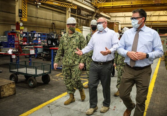 Adm. William Lescher, Vice Chief of Naval Operations, touring Code 930 Inside Machine Shop with Inside Shop Platform Director, Justin Hayden and Group Superintendent, John Rowe, during a visit to Norfolk Naval Shipyard.