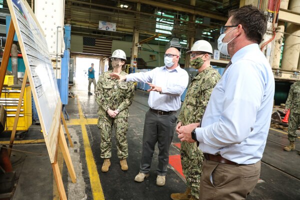 Adm. William Lescher, Vice Chief of Naval Operations, , touring Code 930 Inside Machine Shop with Shipyard Commander, Capt. Dianna Wolfson, Inside Shop Platform Director, Justin Hayden and Group Superintendent, John Rowe, during a visit to Norfolk Naval Shipyard (NNSY).