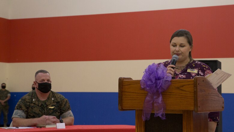 Candice Brown, the school liaison officer for Marine Corps Air Station (MCAS) Yuma, addresses military children at the Youth Center on MCAS Yuma, Ariz., April 14, 2021. The ceremony was held to honor military children by highlighting their unique experiences. (U.S. Marine Corps photo by Cpl. Joseph Exner)