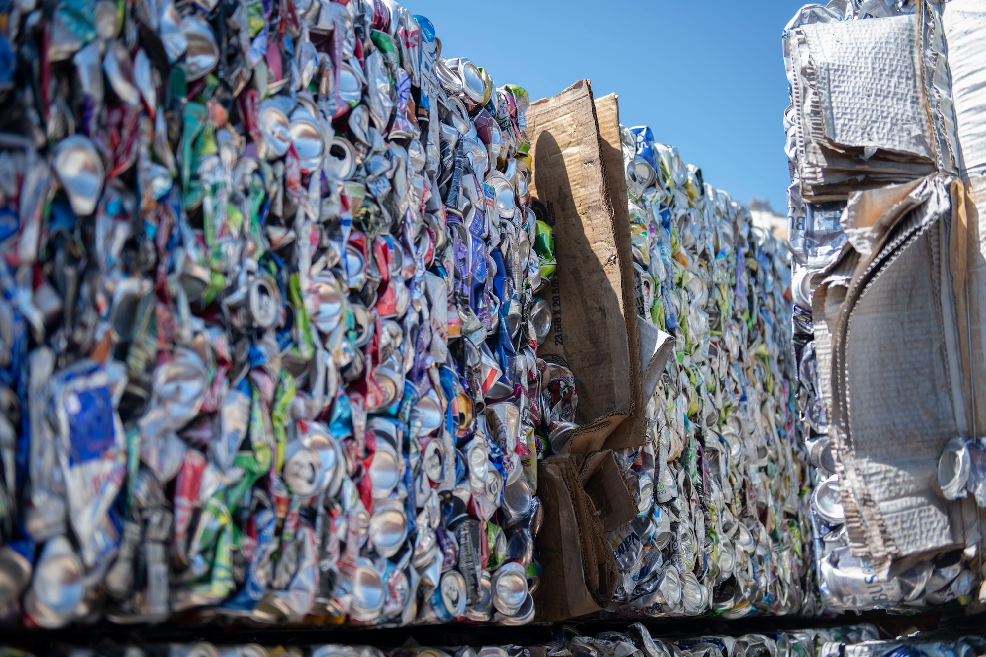 bundles of crushed aluminum cans
