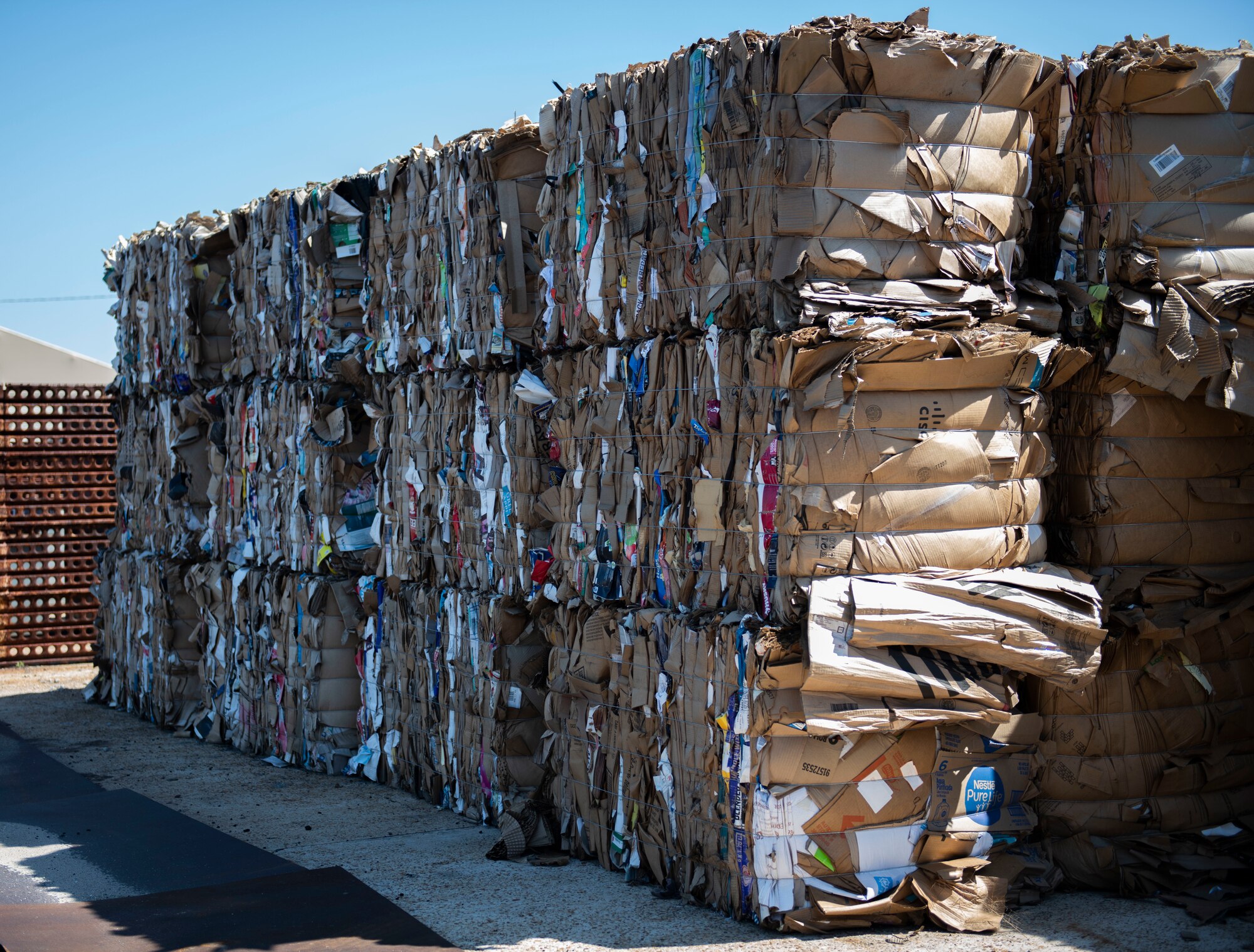 Bundled cardboard boxes stacked in a pile
