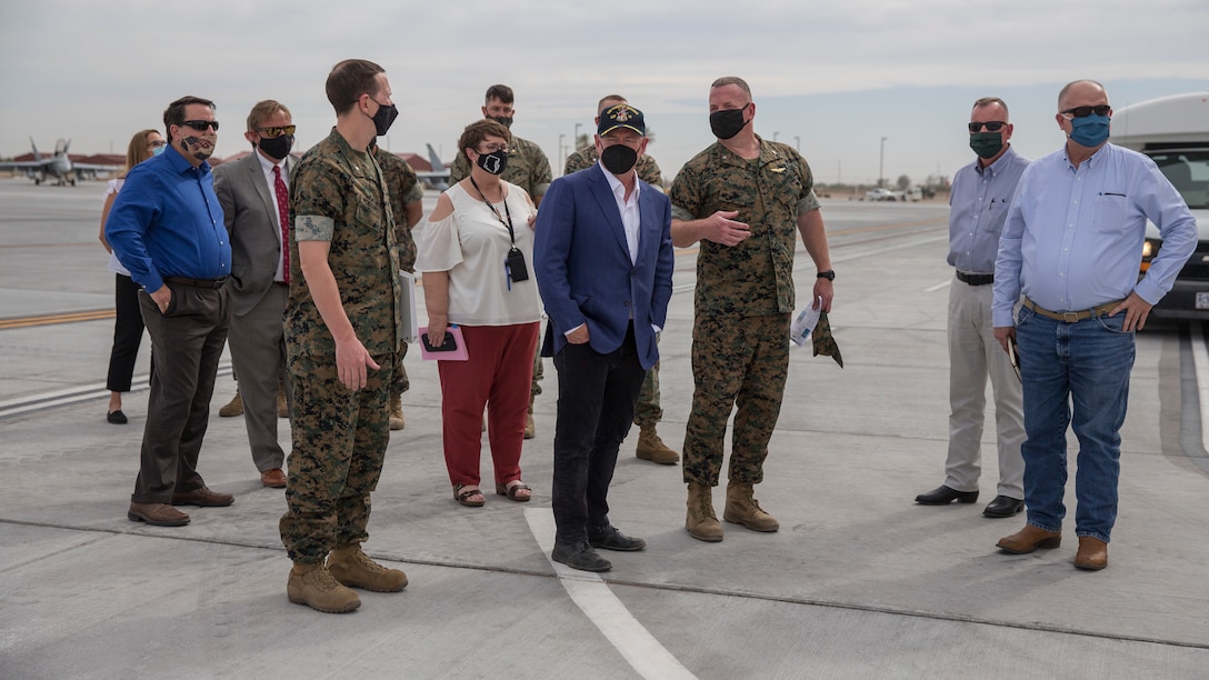 Arizona U.S. Senator Mark Kelly (center) visits Marine Corps Air Station (MCAS) Yuma, Ariz., April 5, 2021.