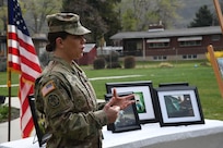 Soldier speaks at a park