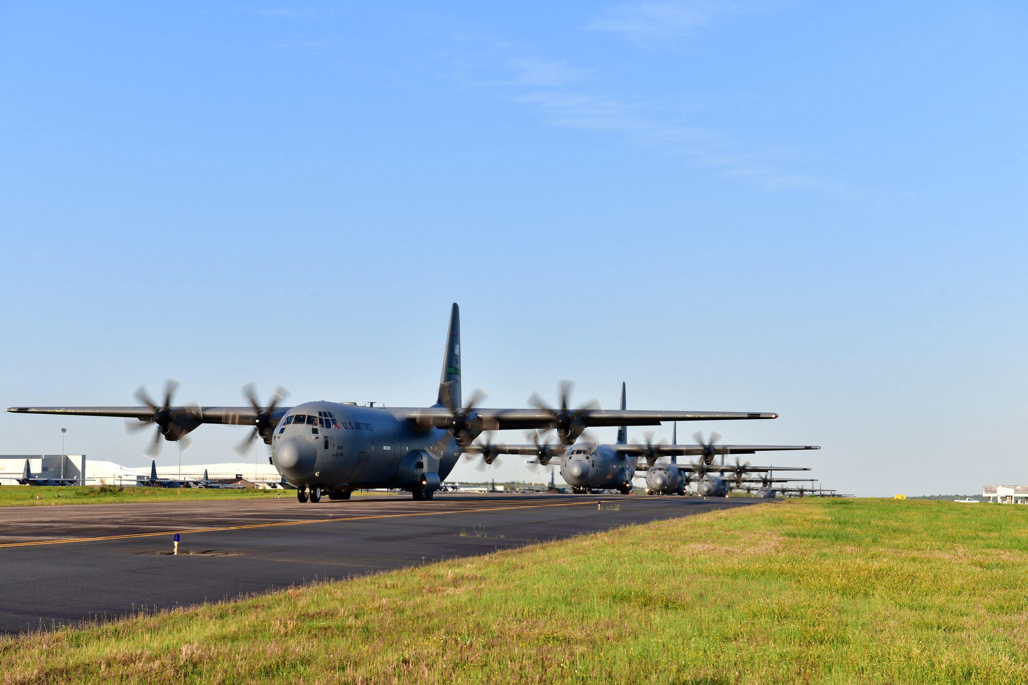 C-130Js line up for takeoff