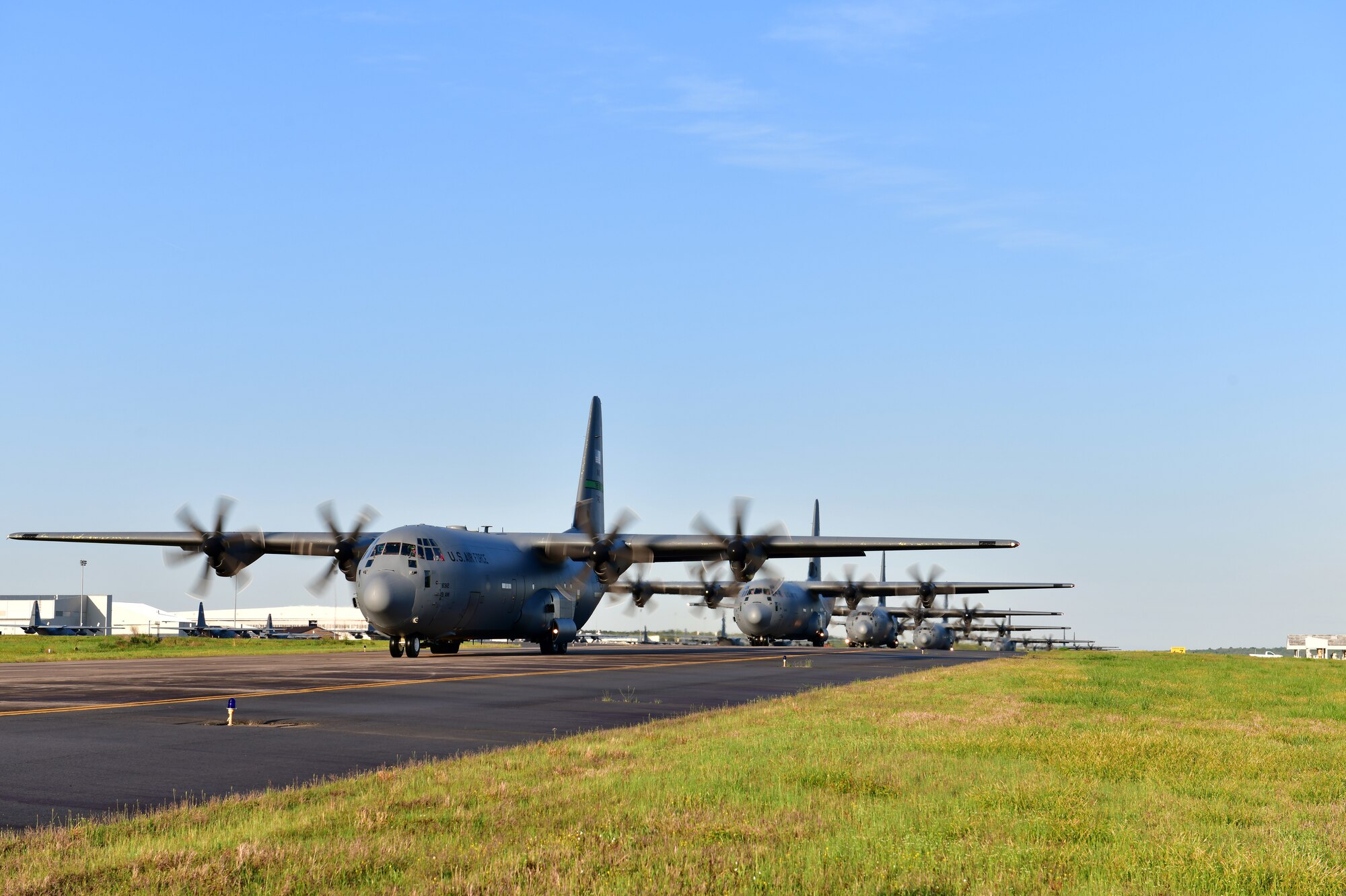 C-130Js line up for takeoff