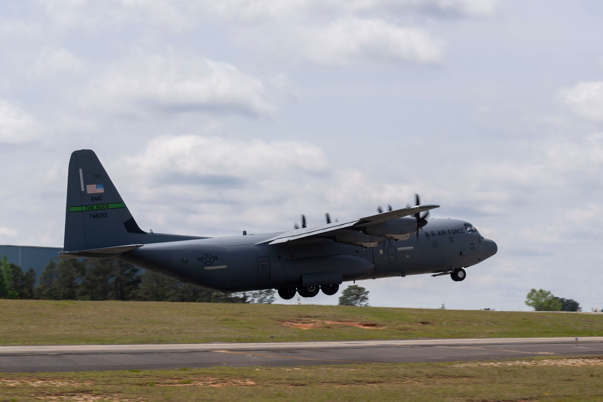 A C-130J takes off