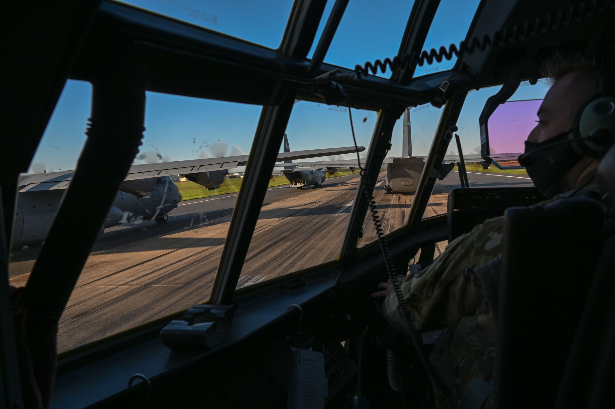 A pilot prepares for take off in a C-130J