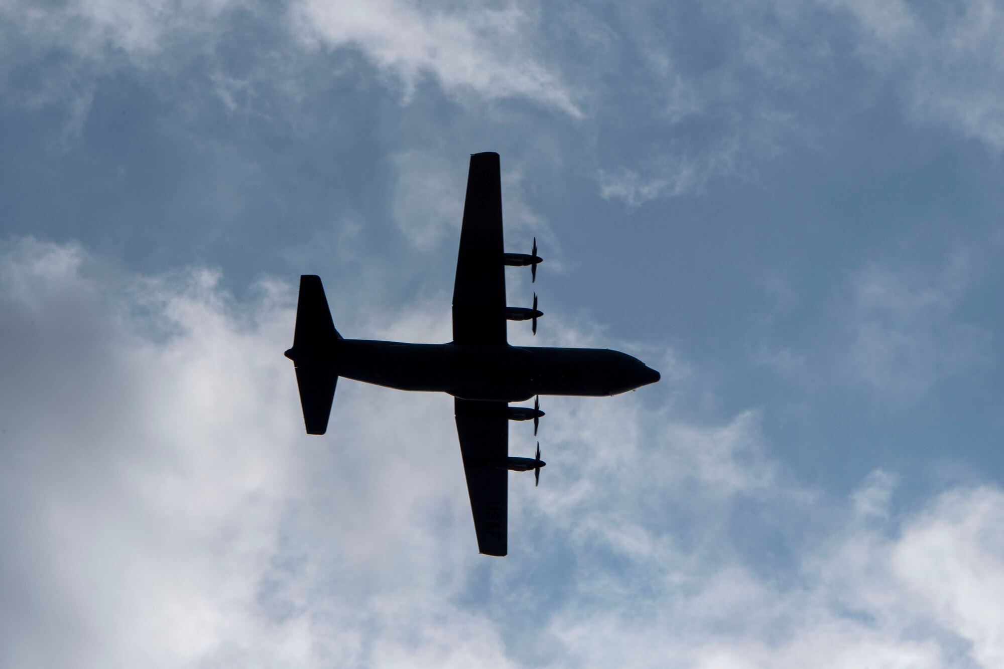 A C-130J flies over Louisiana