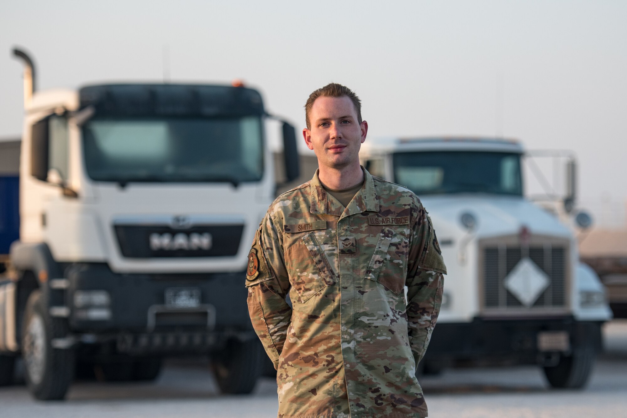 An airman poses for a portrait