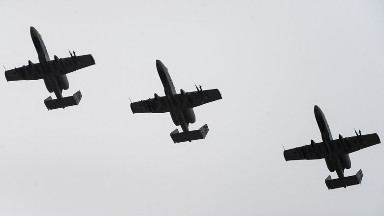 A-10s fly in formation.