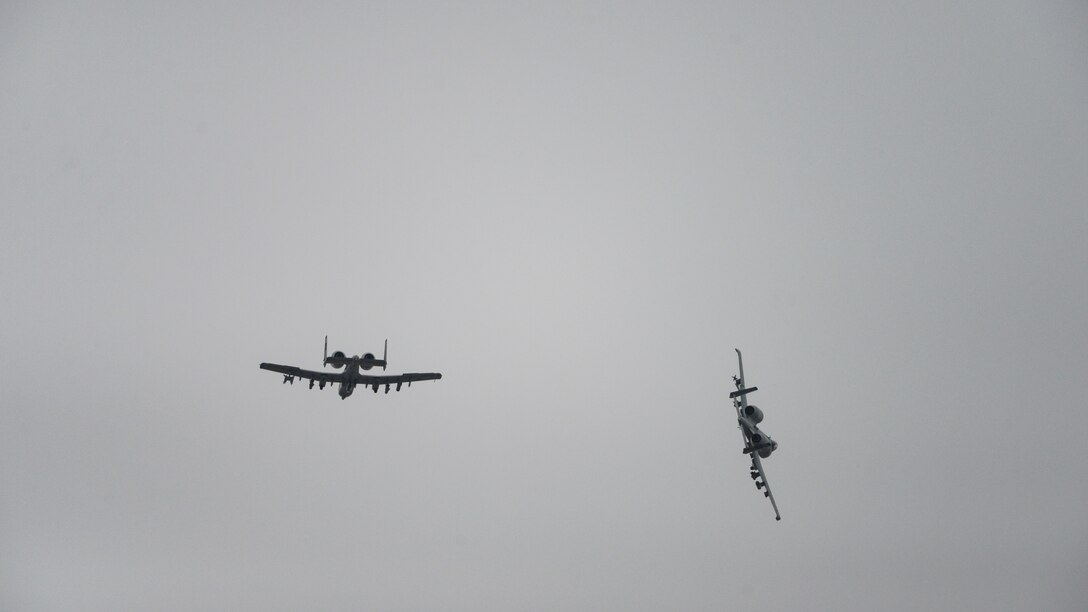 A-10s fly in formation.