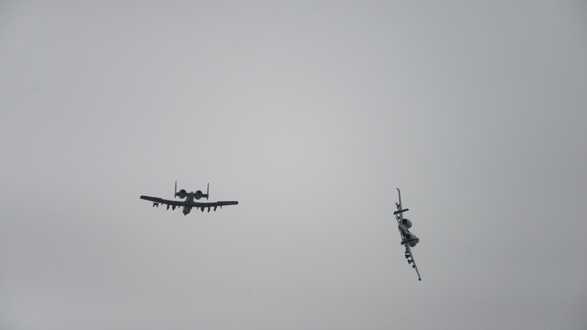 A-10s fly in formation.