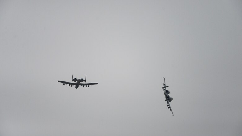 A-10s fly in formation.