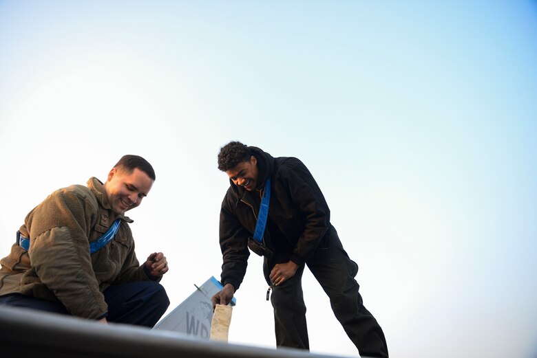 Maintainers prepare an aircraft for maintenance.