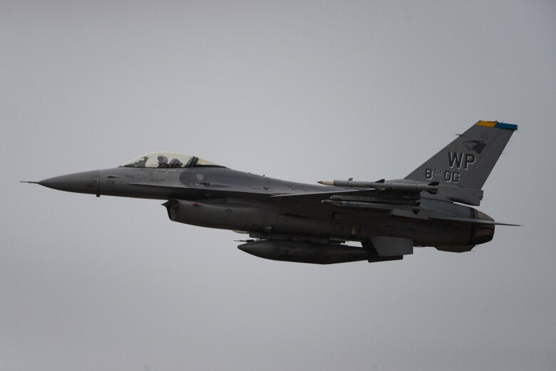 A fighter jet takes flight.