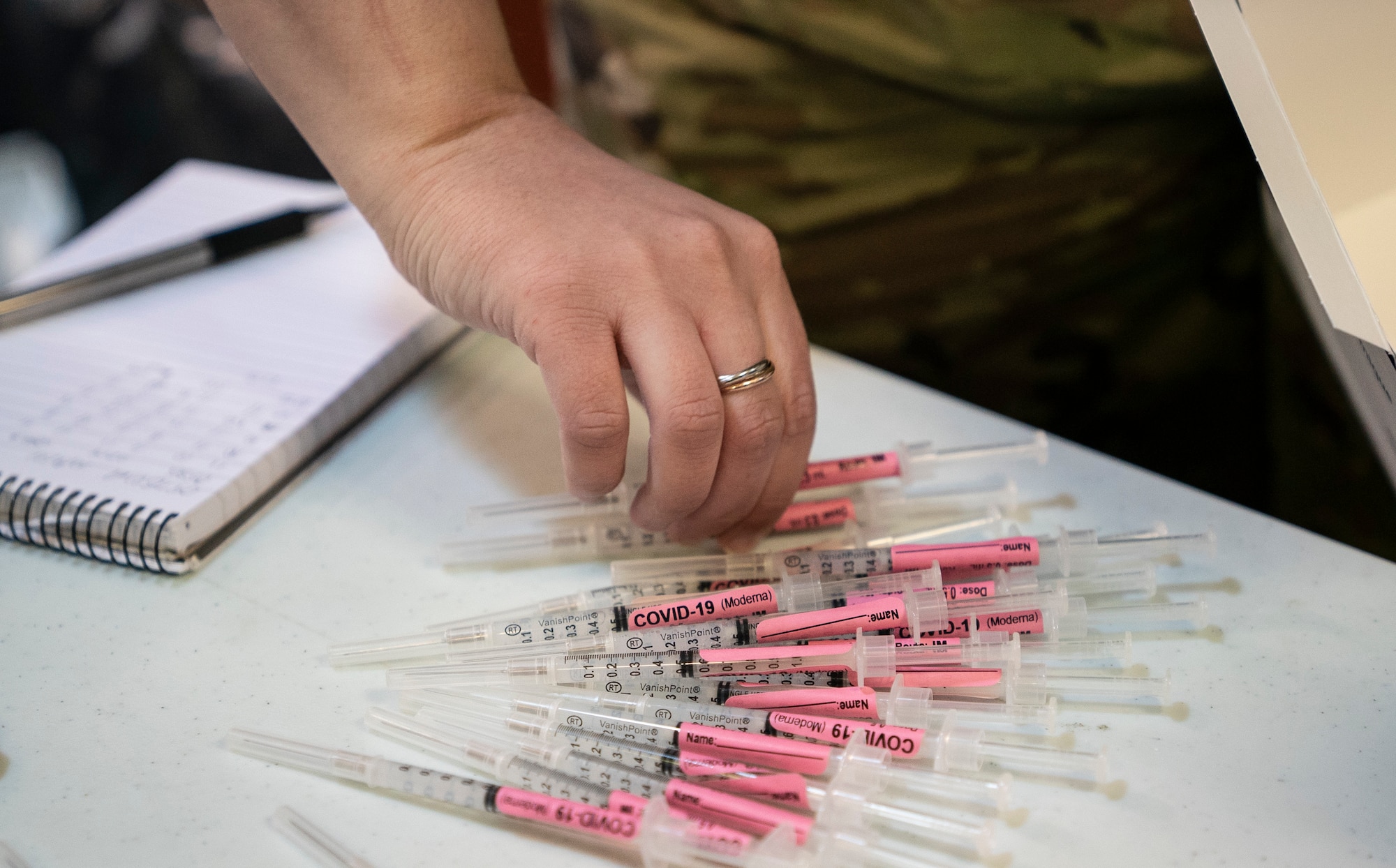 The 48th Medical Group administered the 10,000th COVID-19 vaccine at Royal Air Force Lakenheath, England, April 16, 2021. Personnel were prioritized to receive the vaccine based on the guidance from the Centers for Disease Control and Prevention and on the DoD COVID Task Force’s assessment of unique DoD mission requirements. (U.S. Air Force photo by Airman 1st Class Jessi Monte)