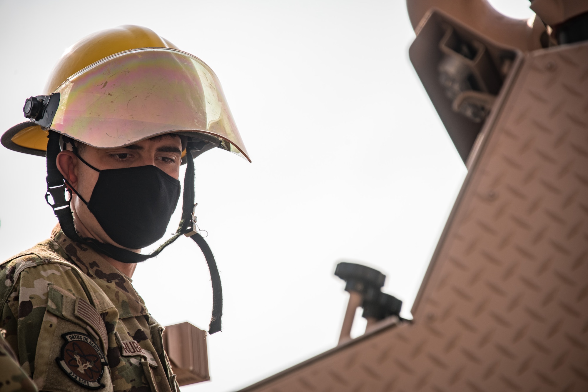 A firefighter with a helmet on