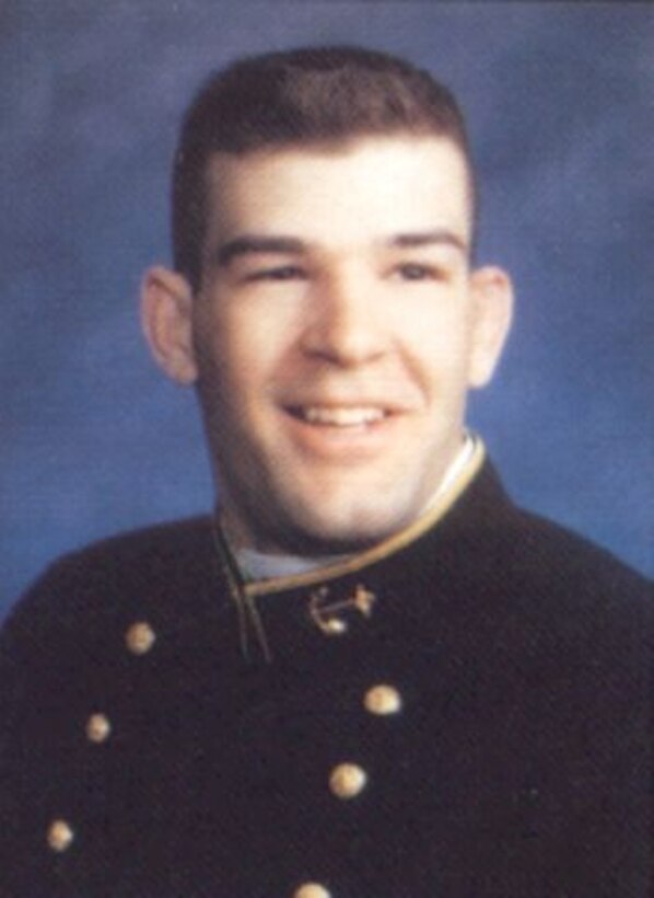 A U.S. Naval Academy cadet poses for a headshot photo.