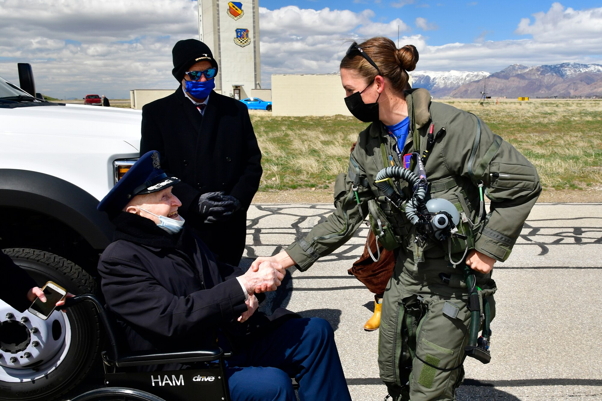 Air Force Col. (Ret.) Gail Halvorsen, the “Berlin Candy Bomber,” meets with Maj. Kristin “BEO” Wolfe, F-35A Lightning II Demo Team pilot, after a demo team practice session April 16, 2021, at Hill Air Force Base, Utah. Halvorsen and family members witnessed the F-35 demo and then visited with the demo pilot and team afterward. (U.S. Air Force photo by Todd Cromar)
