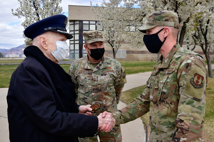 Air Force Col. (Ret.) Gail Halvorsen (left), the “Berlin Candy Bomber,” is greeted by Tech. Sgt. Daniel Sargent (right) and Chief Master Sgt. Andrew Slater, both with the 75th Logistics Readiness Squadron, April 16, 2021, during a visit to Hill Air Force Base, Utah. Sargent was the 2019 Col. Gail Halvorsen Outstanding Air Transportation Individual of the Year award recipient for Air Force Materiel Command. (U.S. Air Force photo by Todd Cromar)