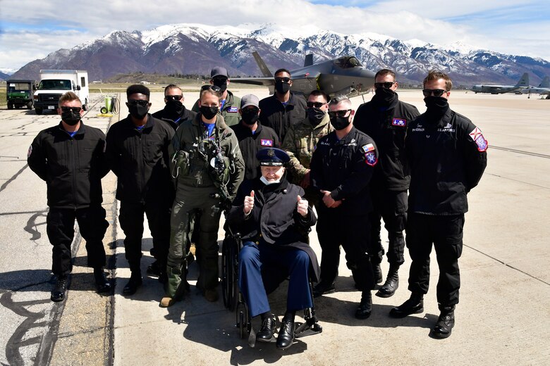 Air Force Col. (Ret.) Gail Halvorsen, the “Berlin Candy Bomber,” poses for a picture with the F-35A Lightning II Demonstration Team after a demo team practice session April 16, 2021, at Hill Air Force Base, Utah. Halvorsen and family members witnessed the F-35 demo and then visited with the demo pilot and team afterward. (U.S. Air Force photo by Todd Cromar)
