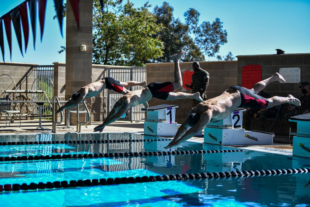 U.S. Marine Corps athletes from Wounded Warrior Battalion West compete in the swimming finals during the 2021 Regional Marine Corps Trials at Marine Corps Base Camp Pendleton, Calif., April 19. The Marine Corps Trials is an opportunity for recovering service members to demonstrate their achievements and serves as the primary venue to select Marine Corps participants for the DoD Warrior Games.