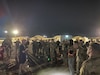 U.S. Soldiers with the 28th Expeditionary Combat Aviation Brigade, currently deployed to the Middle East, tested their minds and bodies during a grueling 18.6-mile ruck march, aiming to earn the Norwegian Foot March badge. The march required Soldiers to wear a 25-pound bag in full uniform and boots within a specified time.