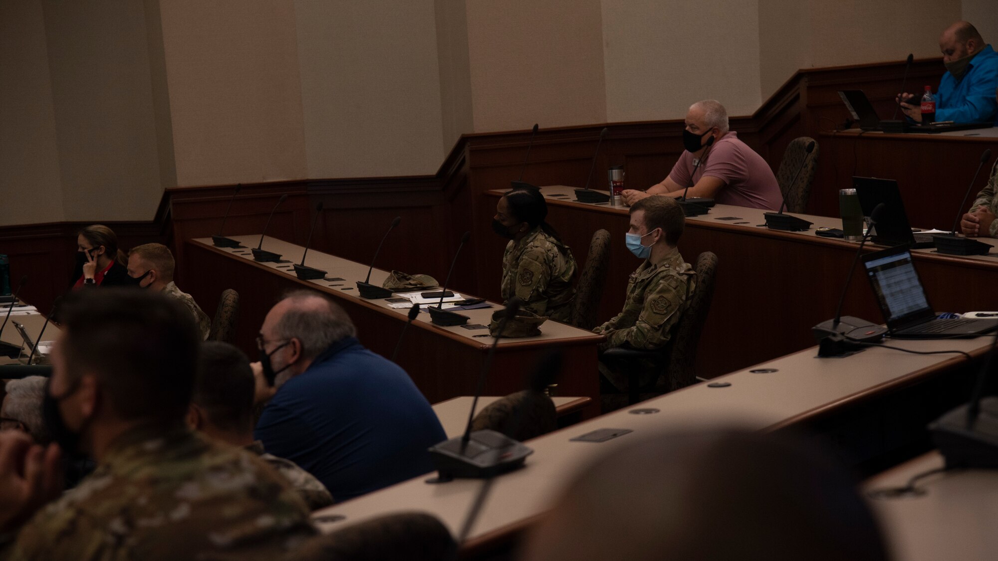 Personnel assigned to MacDill Air Force Base, Fla., attend a briefing during a joint force hurricane exercise, April 20, 2021.