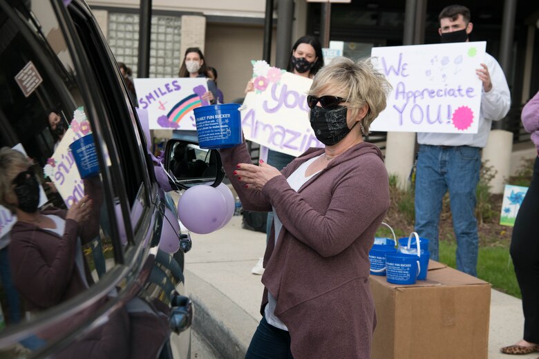 Shawn VanVessen, 436th Operational Medical Readiness Squadron family advocacy intervention specialist, hands out gift buckets at the deployed families dinner hosted by the 436th Medical Group on Dover Air Force Base, Delaware, April 15, 2021. Groups from across the 436th Airlift Wing take turns hosting the quarterly event to give thanks to family members while their loved ones are deployed.
(U.S. Air Force photo by Mauricio Campino)