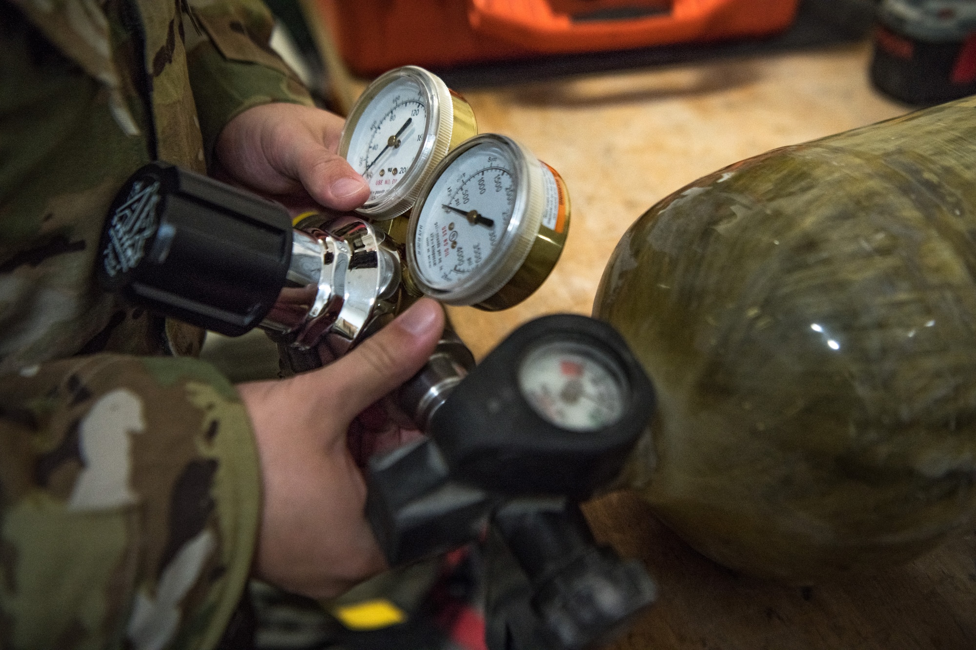 a man tests a self contained breathing apparatus