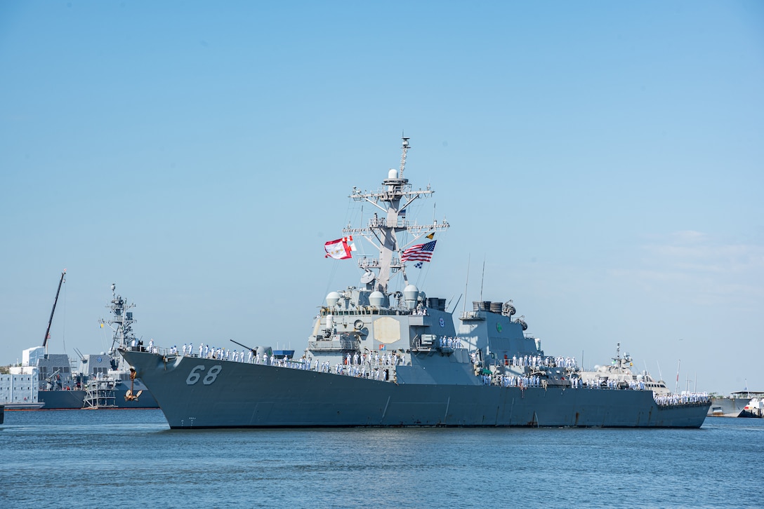 The Arleigh Burke-class guided-missile destroyer USS The Sullivans (DDG 68) departs from Mayport basin for deployment. The Sullivans will work with HMS Queen Elizabeth (R08) Strike Group to improve capability and demonstrate commitment to NATO allies, April 19, 2021.