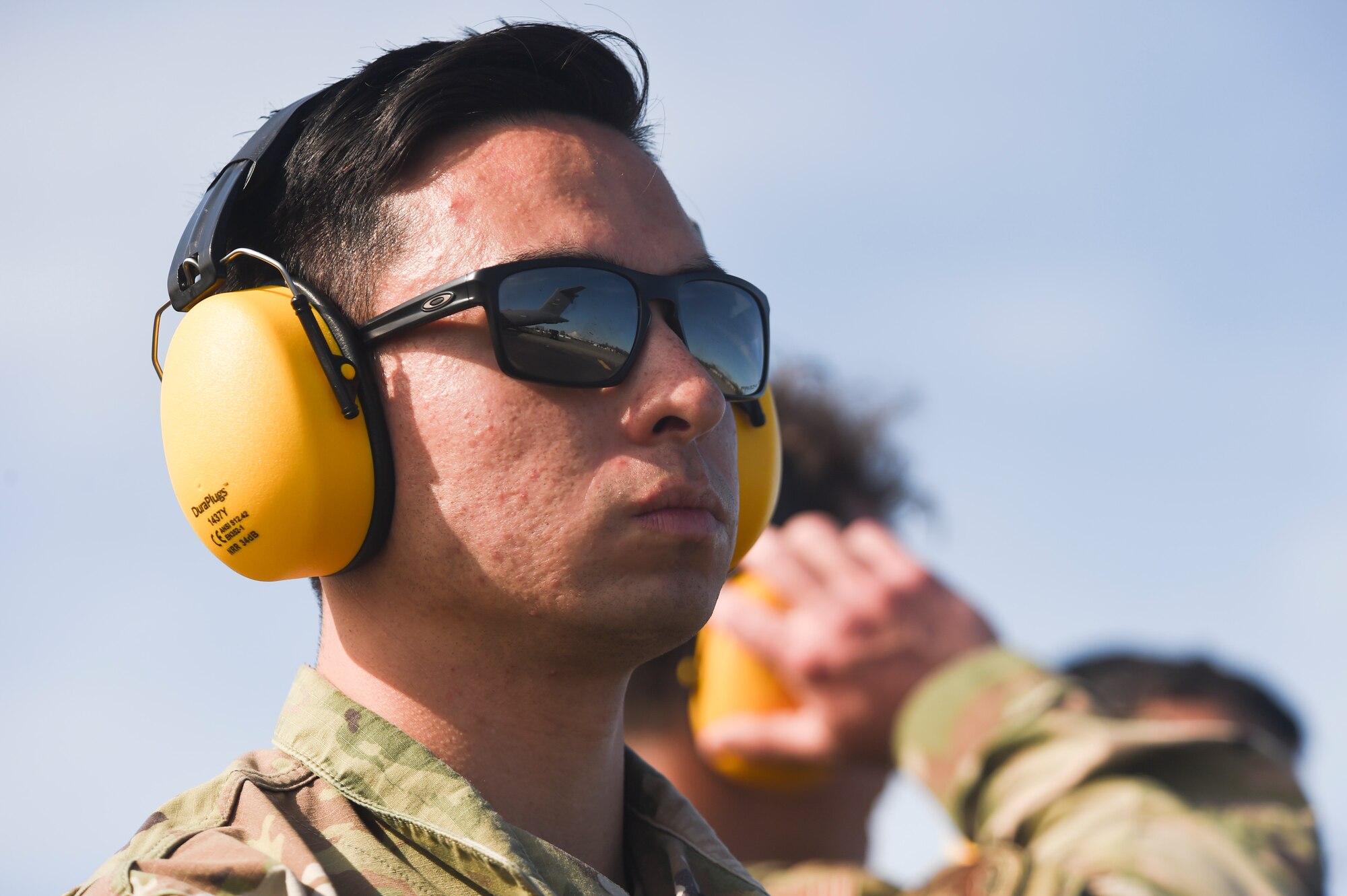 U.S. Air Force 1st Lt. Stephen Gardella, 627th Logistics Readiness Squadron Fuels Management Flight commander, observes the first-ever wet-wing defuel procedure on a C-17 Globemaster III at Joint Base Lewis-McChord, Washington, April 21, 2021, as part of Exercise Rainier War. The exercise tests the 62nd Airlift Wing’s capability to plan, generate and execute a deployment tasking, sustain contingency operations, demonstrate full spectrum readiness while in a contested, degraded and operationally limited environment. (U.S. Air Force photo by Master Sgt. Julius Delos Reyes)