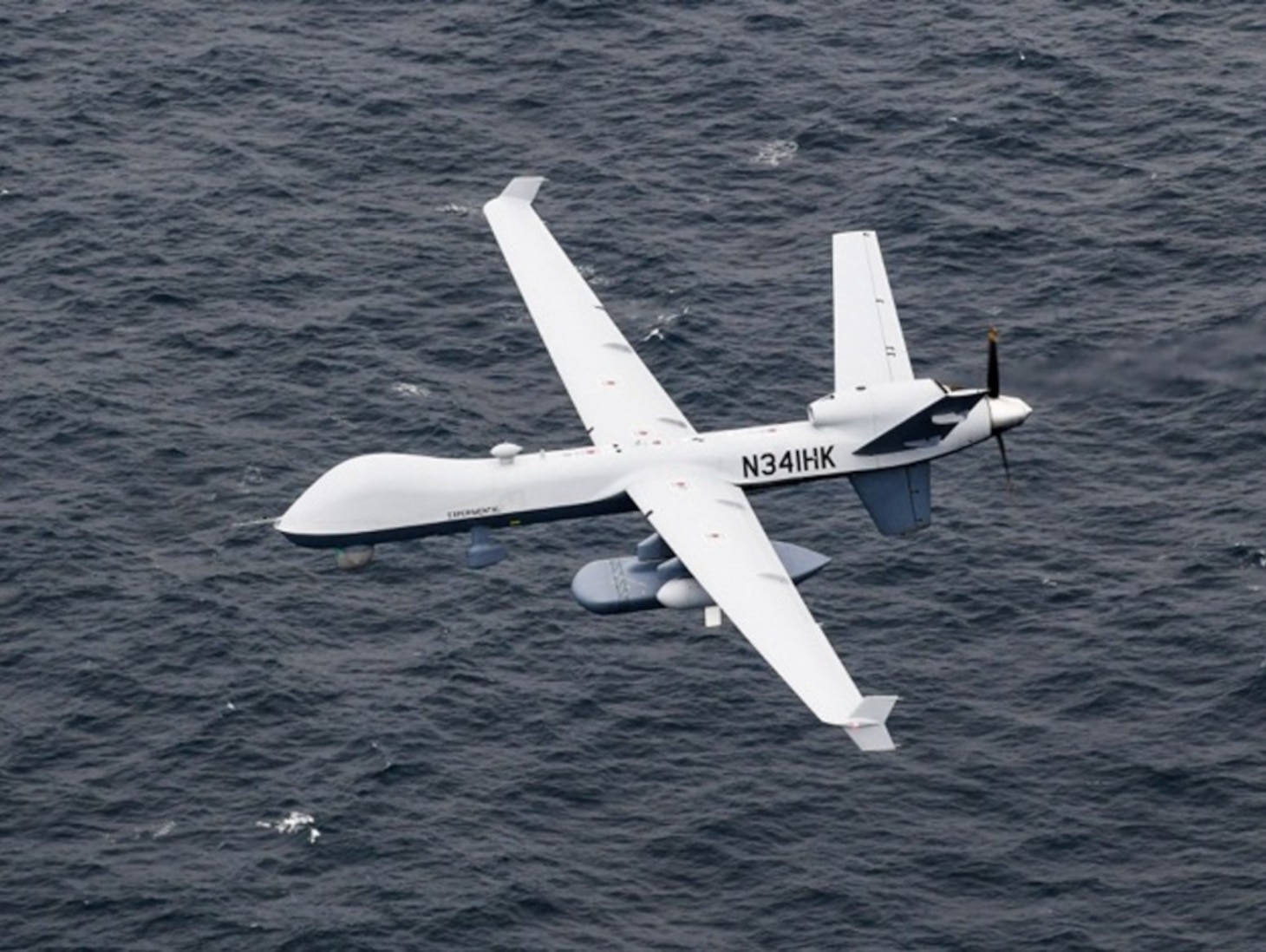 An MQ-9 Sea Guardian unmanned maritime surveillance aircraft system flies over the Pacific Ocean during U.S. Pacific Fleet’s Unmanned Systems Integrated Battle Problem (UxS IBP) 21, April 21. UxS IBP 21 integrates manned and unmanned capabilities into challenging operational scenarios to generate warfighting advantages.