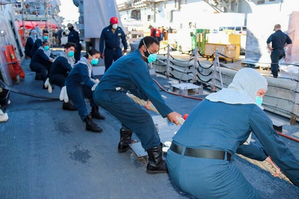 NAVAL STATION NORFOLK (April 15, 2021) -  Sailors aboard the Arleigh Burke-class, guided-missile destroyer USS Oscar Austin (DDG 79) participate in seamanship drills. Newly-reported Sailors undergo a series of evolutions and drills testing their knowledge following command indoctrination. The Sailors then receive their command patch at the completion of drills and evolutions. (U.S. Navy photo courtesy of USS Oscar Austin Public Affairs/Released)