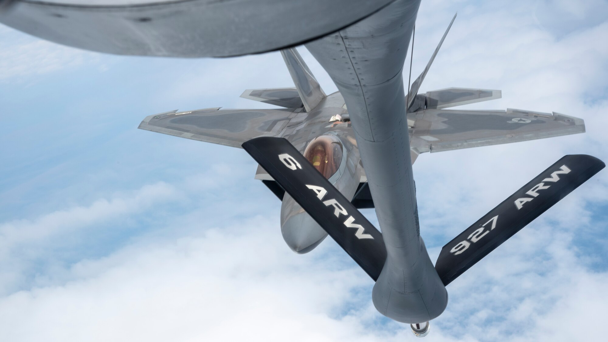 U.S. Air Force Maj. Joshua “Cabo” Gunderson, F-22 Raptor Demonstration Team commander, prepares to receive fuel from a MacDill Air Force Base, Fla., KC-135 Stratotanker, April 17, 2021.