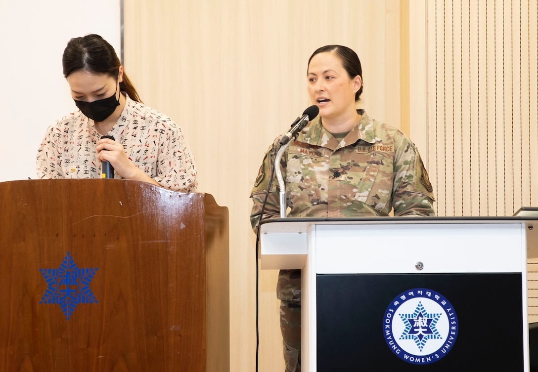 Lt. Col. Victoria Mayo, Office of Special Investigations 5th Field Investigations Squadron Commander, assisted by a Korean  interpreter, delivers her personal story, Answering the Call to Serve, to ROTC cadets and faculty at Sookmyung Women’s University, ROK April 13. The event fostered strategic engagement between the U.S. and the ROK. (Courtesy photo)