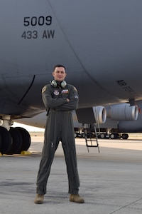 Master Sgt. Jason Henry, 733rd Training Squadron flight engineer instructor, stands in front of a C-5M Super Galaxy at Joint Base San Antonio-Lackland, Texas, March 25, 2021. Henry has served in various roles during his 18 years of service in the Air Force.
