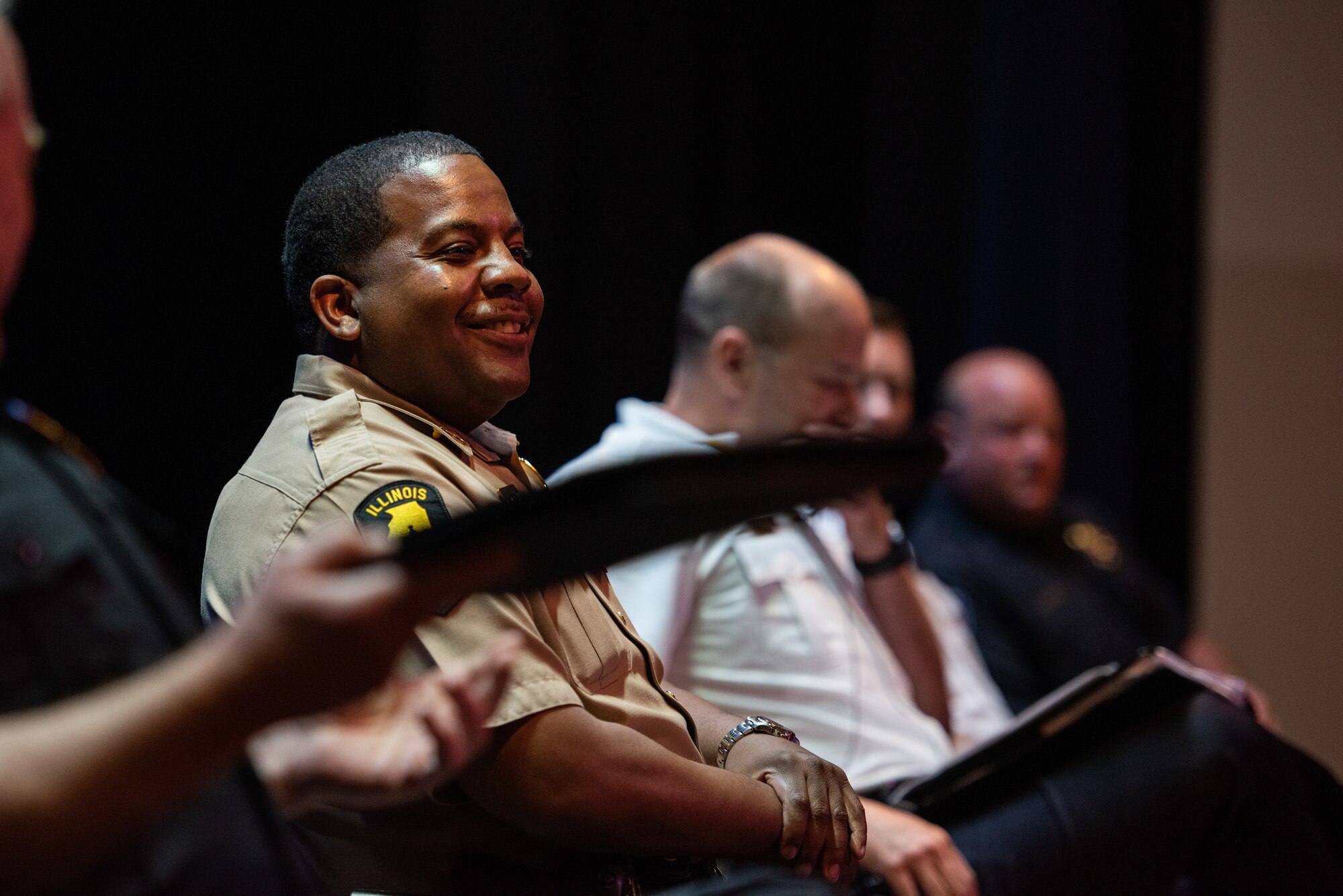 Police officer smiling.