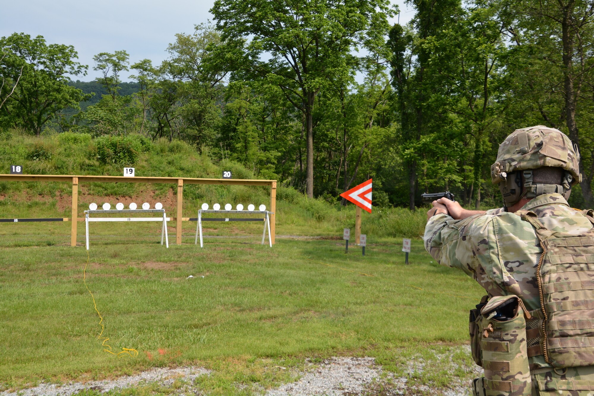 Staff Sgt. Duane Koons, assigned to 3rd Battalion, 166th Training Regiment, Pennsylvania National Guard takes aim during a pistol event at the Pennsylvania National Guard Adjutant General's Combined Arms Match June 2 at Fort Indiantown Gap. (U.S. Army National Guard photo by Lt. Col. Angela King-Sweigart)