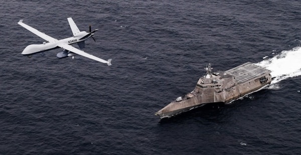 n MQ-9 Sea Guardian unmanned maritime surveillance aircraft system flies over Independence-variant littoral combat ship USS Coronado (LCS 4) during U.S. Pacific Fleet's Unmanned Systems Integrated Battle Problem (UxS IBP) 21.