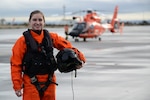 Coast Guard Petty Officer 3rd Class Amber Brewer, an aviation maintenance technician, Air Station Port Angeles, Wash., poses for a picture on the the flight line in front of an MH-65 Dolphin Helicopter, Jan. 26, 2018.

Brewer not only maintains the readiness of the aircraft, but is also a qualified flight mechanic responsible for overseeing the mechanical safety of the helicopter and conducting the essential hoisting operations conducted during rescue swimmer deployments.

U.S. Coast Guard photo by Chief Petty Officer David Mosley