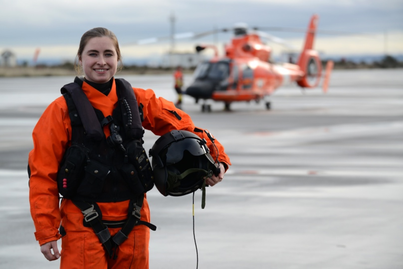 Coast Guard Petty Officer 3rd Class Amber Brewer, an aviation maintenance technician, Air Station Port Angeles, Wash., poses for a picture on the the flight line in front of an MH-65 Dolphin Helicopter, Jan. 26, 2018.

Brewer not only maintains the readiness of the aircraft, but is also a qualified flight mechanic responsible for overseeing the mechanical safety of the helicopter and conducting the essential hoisting operations conducted during rescue swimmer deployments.

U.S. Coast Guard photo by Chief Petty Officer David Mosley