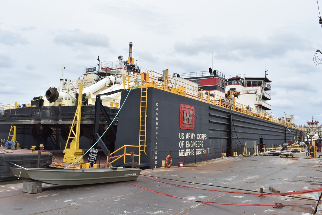 IN THE PHOTO, a photo of the Memphis District’s Dredge Hurley on the Ensley Engineer Yard dry dock, getting repaired after much of the south, including Memphis, Tennessee, was hit hard with frigid temperatures in mid-February this year. From frozen pipes to no electricity, many people and structures were impacted by the icy weather, including the district’s Dredge Hurley. It took approximately one month and multiple Ensley Engineer Yard crews to thaw out and repair the dredge. Now that the Dredge Hurley is thawed and repaired, it’s ready to dredge the Mississippi River, which is scheduled to start within the next two weeks. (USACE photo by Jessica Haas)