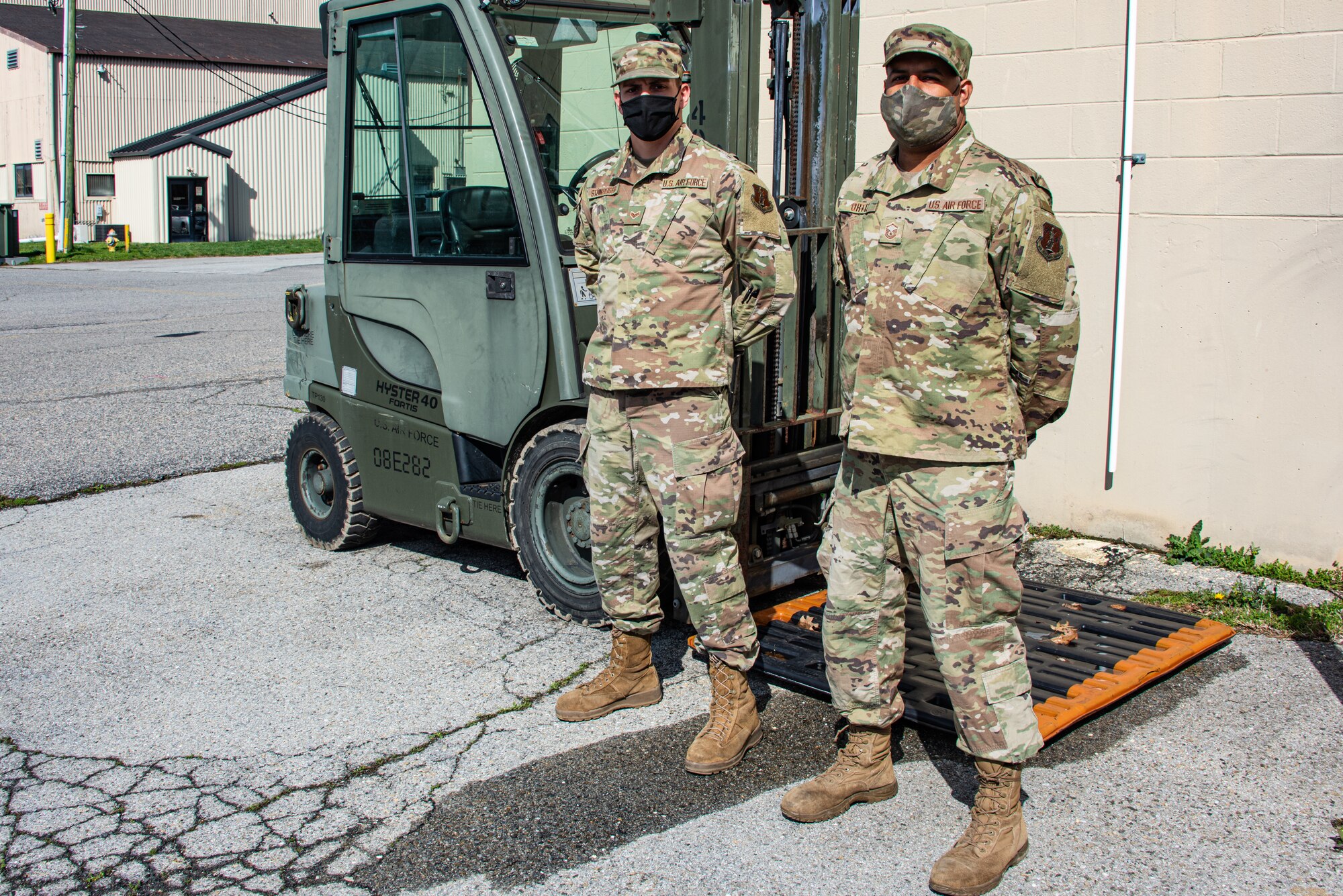SrA Eric Steinbeiser and MSgt Nephtali Ortiz, members of the 166th Logistical Readiness Squadron’s ground transportation section