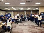 Members of the Incident Command Post for Marine Safety Unit Port Arthur participate in a briefing in Tyler, Texas, August 27, 2020, several hours after Hurricane Laura made landfall. The team is primarily focused on reconstituting the maritime transportation system and addressing any maritime pollution concerns. (U.S. Coast Guard photo by Senior Chief Petty Officer Christie Hamilton)